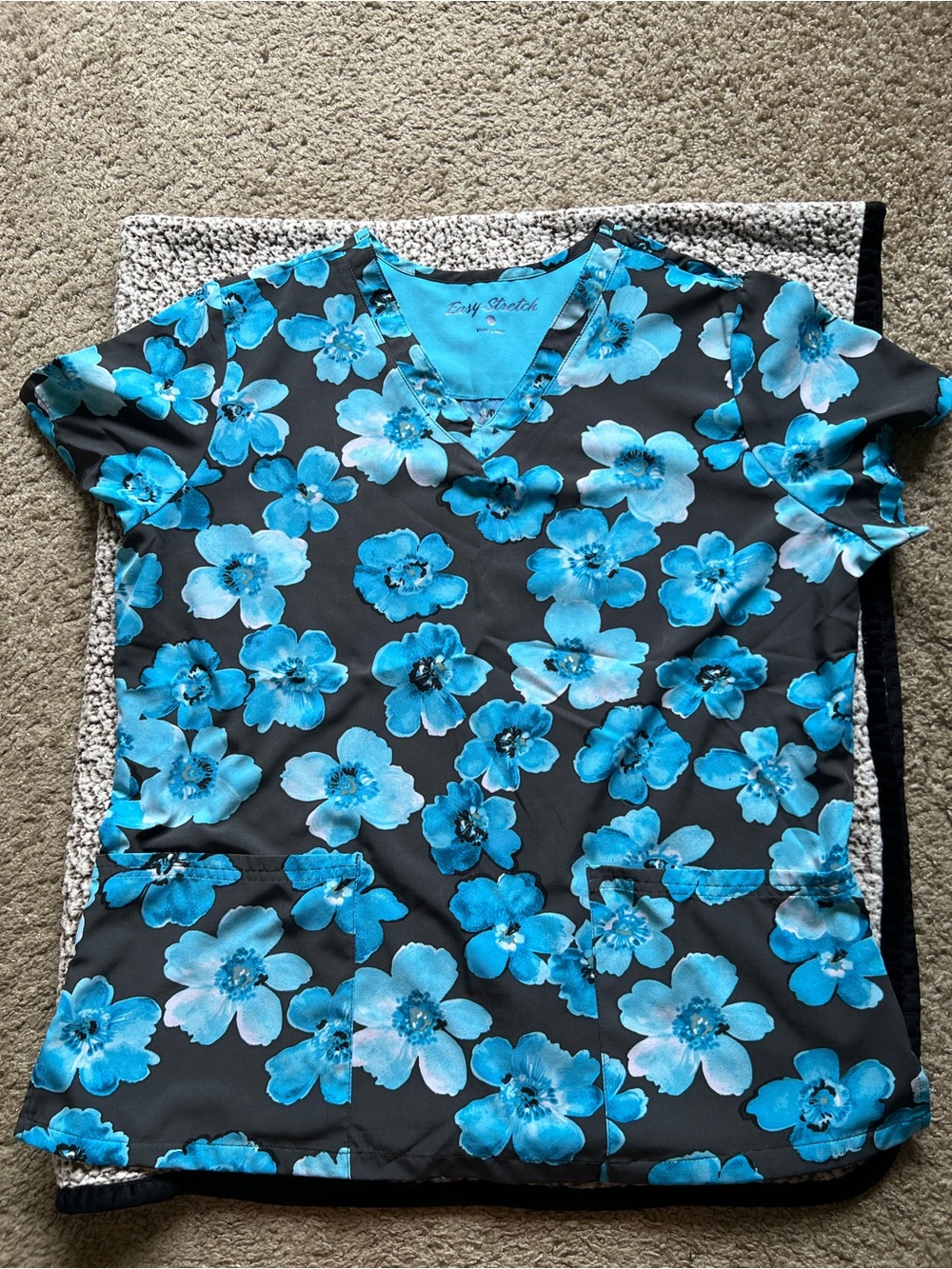 Uniform Advantage Black Scrub Top with Bright Blue Floral Print